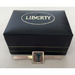 A boxed Liberty tie pin set with classic liberty fabric square shaped design.