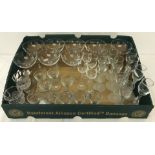 A box of assorted sets of glasses.