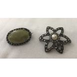 2 vintage silver brooches.