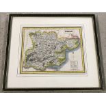 A framed and glazed hand tinted map of Essex .
