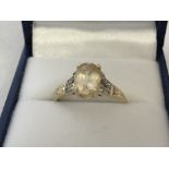 Rocks & Co. 9ct gold dress ring set with Imperial Beryl and diamonds.