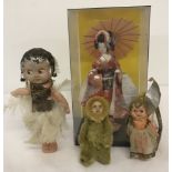 2 vintage Christmas fairies, together with a vintage Eskimo doll and a cased Geisha doll.