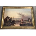 A large gilt framed print " Quiet Evening Hour" depicting a river scene.