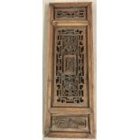 A 19th century Chinese carved wooden panel.