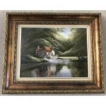 A gilt framed oil on canvas Watermill scene by David James, signed to lower left.