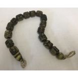 Hand carved soapstone tribal prayer beads.