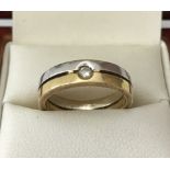 A diamond and 18ct 2-tone gold ring.