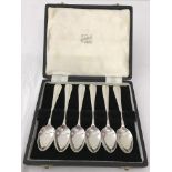 A boxed set of silver tea spoons in W.R.Bullen of Norwich box.