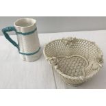 A Belleek trefoil basket together with a 19th century unmarked basket weave jug.