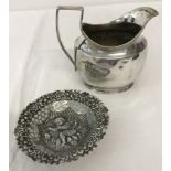 A decorative silver pin dish with cherub design to base, hallmarked Birmingham 1899,approx. 20g.