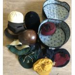 A collection of vintage hats to include cricket , jockey and berets.