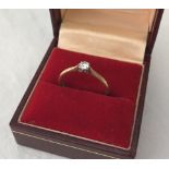 An 18ct gold & diamond solitaire ring.