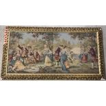 A large gilt framed tapestry depicting a classical picnic scene.
