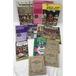 A collection of sporting ephemera to include 3 football cigarette card sets , programmes & books.