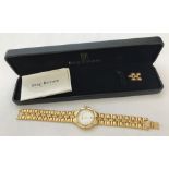 An 18ct gold plated boxed men's Krug-Baumen quartz watch, in working order.