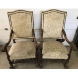 A pair of French 19th century oak hall armchairs.