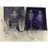 A small collection of cut lead crystal glasses to include boxed Edinburgh crystal champagne flutes.