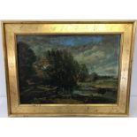 A gilt framed oil on board of a country river scene.
