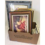 A box of framed pictures. To include prints and 3D flower pictures.
