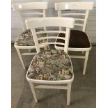 3 vintage curve backed kitchen chairs painted white.