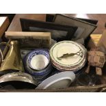 A box of misc items to include blue and white ceramics, pictures and metalware.