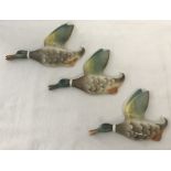 A set of 3 flying ceramic wall hanging ducks by Keele Street pottery