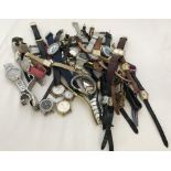 A large collection of ladies and gents wrist watches and watch faces.