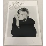 A signed photo of actress Susan George.