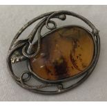 A Art Nouveau style 925 silver brooch Set with amber.