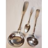 A large German 12 loth ( 750 ) silver ladle and a 12 loth serving spoon.
