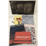 A collection of 8 Patek Philippe catalogues and magazines.