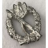 A WWII pattern German Infantry assault silver award badge.
