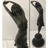 An Art Deco style bronze "Crimean Dancer" by Colinet on a circular black marble base.