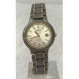 A ladies titanium Seiko watch on stainless steel strap.