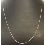 A 18ct gold fine chain. 18 inch length.