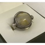 A modern design 925 silver ring set with natural agate.