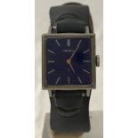 A ladies blue square cased Seiko 17 jewels manual wind watch on blue leather strap.