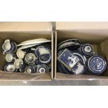 A large quantity of blue and white Willow pattern ceramics.