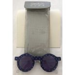 A pair of cased Swatch eyes designer sunglasses.