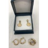 3 pairs of small 9ct gold earrings.