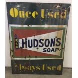A large enamel advertising sign for Hudson's Soap.