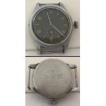 A British Military issue watch head by Timor marked with war dept. arrow.