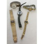A small collection of vintage wrist watches.