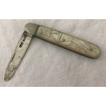 A silver blade fruit knife with mother of pearl handle.