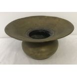 An early 20th century brass spittoon.