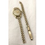 A vintage ladies Gruen precision ladies 9ct gold wristwatch.