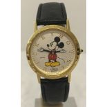 A Disney Mickey Mouse Lorus quartz watch with riveted dial and original strap.