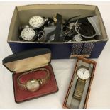 A box of vintage pocket and wrist watches in varying condition.