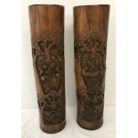 A pair of 19th century carved bamboo brush pots.