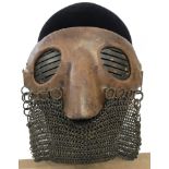 A WWI leather and chain anti-splatter Tankers mask with fabric straps.